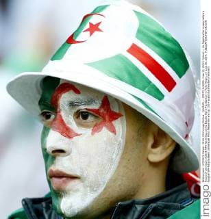 (140630) -- PORTO ALEGRE, June 30, 2014 (Xinhua) -- An Algeria s fan is seen before a Round of 16 match of 2014 FIFA World Cup at the Estadio Beira-Rio Stadium in Porto Alegre, on June 30, 2014. 