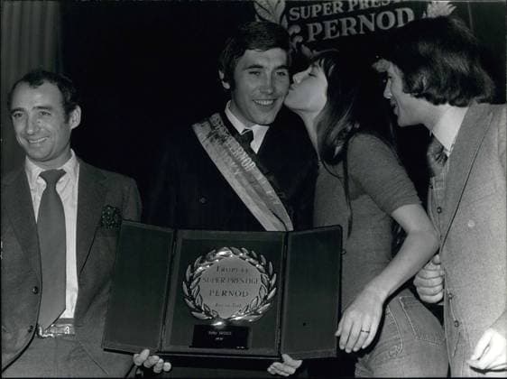 Nov. 15, 1974 - Cycling champion, Eddy Merckx received the Super Prestige Pernod trophy and 35,000 Francs at a hotel in Paris yesterday. He is pictured here being congratulated.  - ZUMAk09
