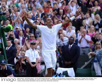 Tennis - 2014 Wimbledon Championships - Week Two, Tuesday Mens Singles, Third Round: Nick Kyrgios celebrates his victory on Centre Court. COLORSPORT ANDREW COWIE 