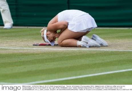 Tennis: Wimbledon Championship 2014, Sabine Lisicki of Germany after winning her Ladies Singles fourth round match on day eight of the Wimbledon Lawn Tennis Championships at the All England Lawn Tennis and Croquet Club at Wimbledon on July 1, 2014, London, England. xKirstenxHolstx xHOCHxZWEIx