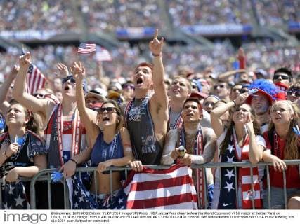 USA soccer fans cheer before the World Cup round of 16 match at Soldier Field on July 1, 2014 in Chicago.  CHI2014070106