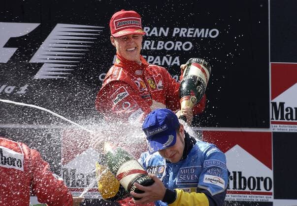 SCHUMACHER Michael Team Scuderia Ferrari Weltmeister mit Fernando ALONSO bei der Siegeehrung FIA Formel 1 Grand Prix von Spanien 2003 in Barcelona am 04. Mai 2003 in Barcelona 