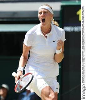 Tennis - 2014 Wimbledon Championships - Week Two, Thursday Womens Singles, SemiFinals Petra Kvitova celebrates her point on Centre Court. COLORSPORT ANDREW COWIE 