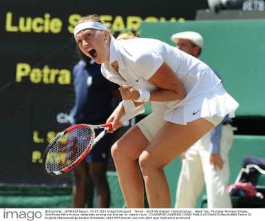 Tennis - 2014 Wimbledon Championships - Week Two, Thursday Womens Singles, SemiFinals Petra Kvitova celebrates winning the first set on Centre Court. COLORSPORT ANDREW COWIE 