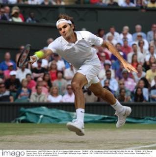 TENNIS - ATP, Wimbledon 2014 LONDON,ENGLAND,04.JUL.14 - TENNIS - ATP Tennis Herren World Tour, Wimbledon 2014, Grand Slam. Bild zeigt Roger Federer (SUI). 