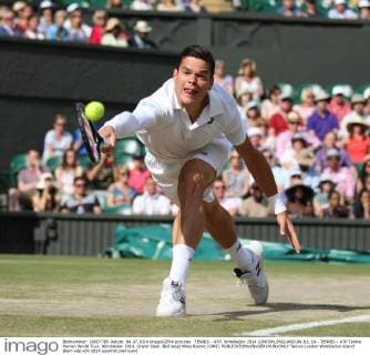 TENNIS - ATP, Wimbledon 2014 LONDON,ENGLAND,04.JUL.14 - TENNIS - ATP Tennis Herren World Tour, Wimbledon 2014, Grand Slam. Bild zeigt Milos Raonic (CAN). 