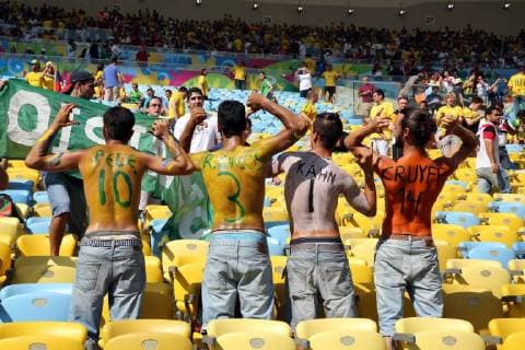 04.07.2014. Rio De Janerio, Brazil. FIFA World Cup 2014 quarter final soccer match between France and Germany at Estadio do Maracana in Rio de Janeiro, . Fans in the stand with backs painted national colours xPaoloxNuccix  ActionPlus11539366