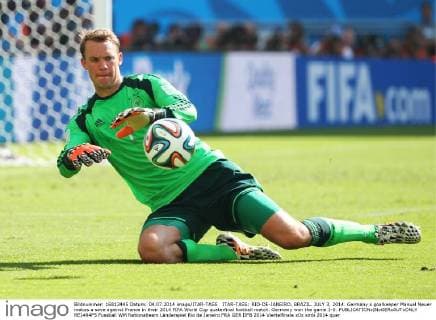 ITAR-TASS: RIO-DE-JANEIRO, BRAZIL. JULY 3, 2014. Germany s goalkeeper Manuel Neuer makes a save against France in their 2014 FIFA World Cup quaterfinal football match. Germany won the game 1-0.  RE1494F5