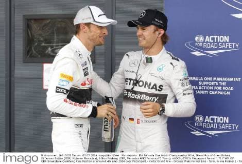 Motorsports: FIA Formula One World Championship 2014, Grand Prix of Great Britain, 22 Jenson Button (GBR, McLaren Mercedes), 6 Nico Rosberg (GER, Mercedes AMG Petronas F1 Team), xHOCHxZWEIx