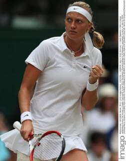 (140705) -- LONDON, July 5, 2014 (Xinhua) -- Czech Republic s Petra Kvitova celebrates during the women s singles final match at the 2014 Wimbledon Championships in Wimbledon, southwest London, on July 5, 2014. (Xinhua Meng Yongmin) (SP)BRITAIN-LONDON-TENNIS-WIMBLEDON-WOMEN S SINGLES FINAL 