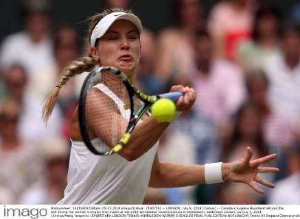 (140705) -- LONDON, July 5, 2014 (Xinhua) -- Canada s Eugenie Bouchard returns the ball during the women s singles final match at the 2014 Wimbledon Championships in Wimbledon, southwest London, on July 5, 2014. (Xinhua Meng Yongmin) (SP)BRITAIN-LONDON-TENNIS-WIMBLEDON-WOMEN S SINGLES FINAL 