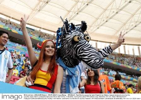 BRASILIA: Red Devils supporter and Argentinian Zebra mascot pictured prior to the quarter final match in Estadio Nacional Mane Garrincha, in Brasilia, during the 2014 FIFA World Cup, Saturday 05 July 2014. BRUNOxFAHY  Aufmacher premiumd kurios Komik 11602
