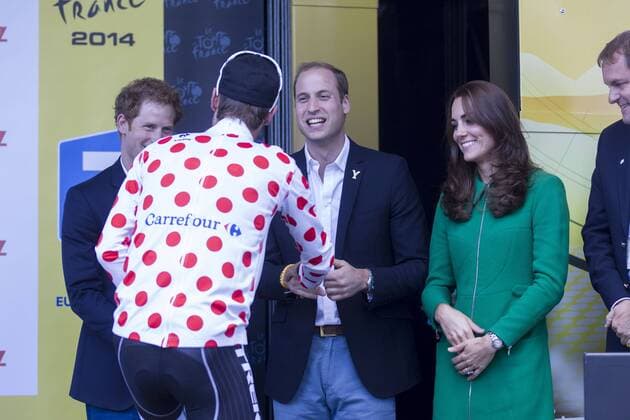The Duchess of Cambridge, alongside Prince William and Prince Harry, congratulate Jens Voigt who won the Poker Dot Jersey, following the first stage of the Tour De France. 05 07 2014. Harrogate, United Kingdom. Tour De France. . i-Images  IIM-2601-0006