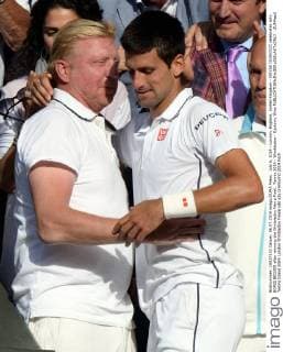 July 6, 2014 - London, England, United Kingdom - NOVAK DJOKOVIC celebrates with BORIS BECKER after winning the Wimbledon Men s Final. Tennis 2014 - Wimbledon - Djokovic Wins  - ZUMAap2