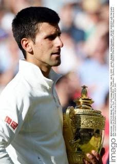 July 6, 2014 - London, England, United Kingdom - NOVAK DJOKOVIC with the trophy after winning the Wimbledon Men s Final. Tennis 2014 - Wimbledon - Djokovic Wins  - ZUMAap2
