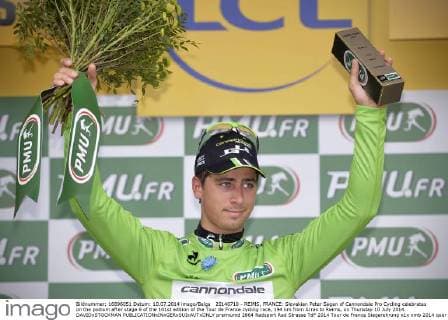 20140710 - REIMS, FRANCE: Slovakian Peter Sagan of Cannondale Pro Cycling celebrates on the podium after stage 6 of the 101st edition of the Tour de France cycling race, 194 km from Arras to Reims, on Thursday 10 July 2014. DAVIDxSTOCKMAN  premiumd 2864