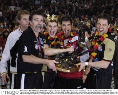 BRAND Heiner Trainer Team Deutschland von links BRAND Heiner, KRAUS Michael, FRITZ Henning und BAUR Markus WELTMEISTER TEAM_DEUTSCHLAND Handball_Weltmeister_BRD Handball Weltmeisterschaften 2007 in Deutschland Finale BRD-Polen Siegeehrung 