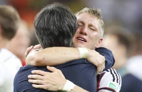 Bastian SCHWEINSTEIGER, DFB 7 DFB Bundestrainer Joachim Jogi Löw, LÖW,Traenen Umarmung Jubel DEUTSCHLAND FIFA Fussball WM FINALE Weltmeisterschaft am 13.07.2014 im Maracana Stadion von Rio de Janeiro