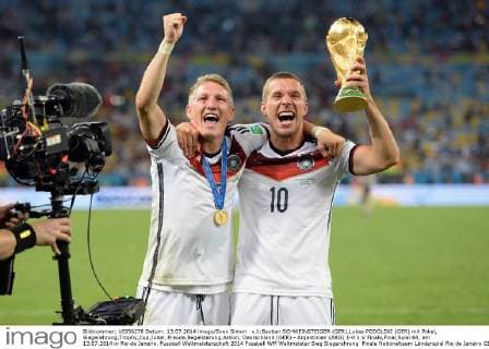 v.li:Bastian SCHWEINSTEIGER (GER),Lukas PODOLSKI (GER) mit Pokal, Siegerehrung,Trophy,Cup,Jubel, Freude,Begeisterung,Aktion, Deutschland (GER) - Argentinien (ARG) 1-0 n.V Finale,Final,Spiel 64, am 13.07.2014 in Rio de Janeiro. Fussball Weltmeisterschaft 2014