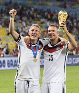 Rio de Janeiro, 13.07.2014, Estadio do Maracana - Schlussjubel: Bastian Schweinsteiger (Deutschland), Lukas Podolski (Deutschland) - Deutschland - Argentinien