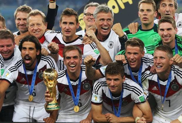 Football - 2014 FIFA World Cup - Final: Philipp Lahm of Germany lifts the trophy at the Estadio Maracana, Rio de Janeiro  5238-1