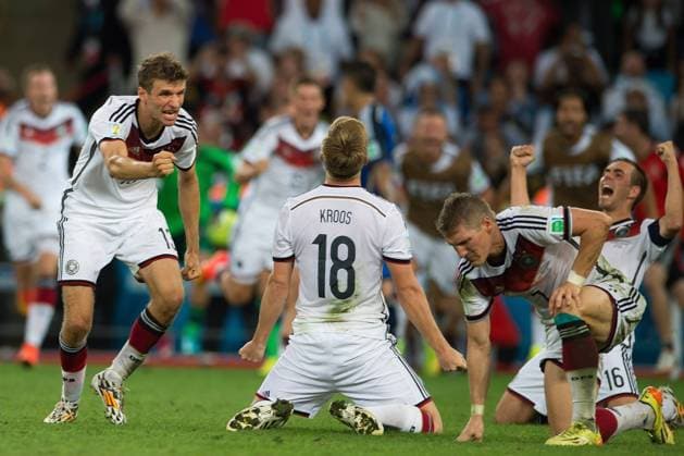 Left to Right, Thomas Müller, Toni Kroos and Bastian Schweinsteiger of Germany celebrate victory 13 07 2014 xROBERTOxMAYAx 