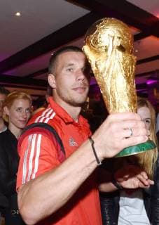Lukas PODOLSKI (Deutschland) mit dem Weltpokal WM-Pokal. DFB-WM Party Gala Feier nach dem Finale im Hotel Sheraton Rio de Janeiro. - Deutschland - Argentinien, Finale, Fussball Weltmeisterschaft 2014,Rio de Janeiro, 13.07.2014- Germany vs. Argentina- FIFA- Soccer World Cup 2014 - poolphoto