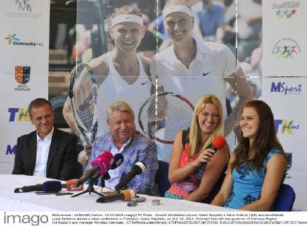 Double Wimbledon winner Czech Republic s Petra Kvitova (left) and semifinalist Lucie Safarova attend a news conference in Prostejov, Czech Republic, on July 14, 2014. Pictured from left are governor of Olomouc Region Jiri Rozboril and manager Miroslav Cernosek. (CTKxPhotoLudekxPerina) CTKPhotoOF201407140753701  LPE 003