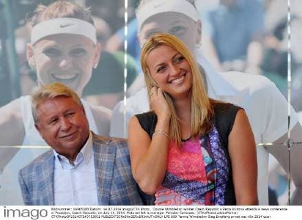 Double Wimbledon winner Czech Republic s Petra Kvitova attends a news conference in Prostejov, Czech Republic, on July 14, 2014. Pictured left is manager Miroslav Cernosek. (CTKxPhotoLudekxPerina) CTKPhotoOF201407140753601  LPE 009