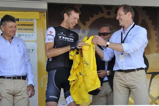 VOIGT Jens (GER - TREK FACTORY RACING) receives 6 yellow jerseys for his kids out of the hand of Christian Prudhomme CYCLISME : Tour de France - Etape 10 - Mulhouse to Planche des Belles Filles - 14 07 2014 PhotoNews Panoramic 