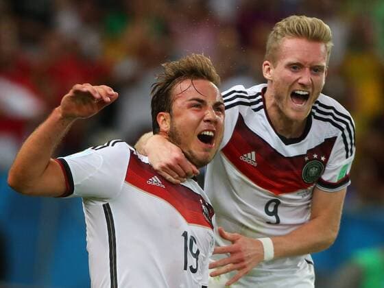 ITAR-TASS: RIO DE JANEIRO, BRAZIL. JULY 13, 2014. Germany s Mario Goetze (L) celebrates scoring the winning goal in the 2014 FIFA World Cup final match against Argentina at Maracana Stadium. The German team won the game 1:0 in extra time. Also pictured: Germany s Andre Schuerrle (R). Photo ITAR-TASS Valery Sharifulin  RE14A210