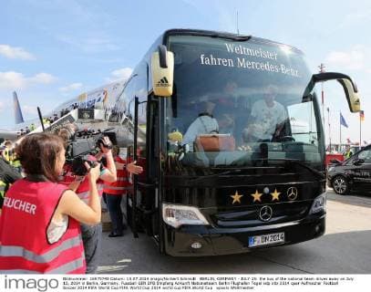 BERLIN, GERMANY - JULY 15: the bus of the national team drives away on July 15, 2014 in Berlin, Germany.