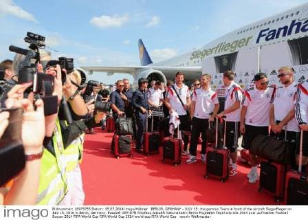 BERLIN, GERMANY - JULY 15: the german Team in front of the aircraft Siegerflieger on July 15, 2014 in Berlin, Germany.