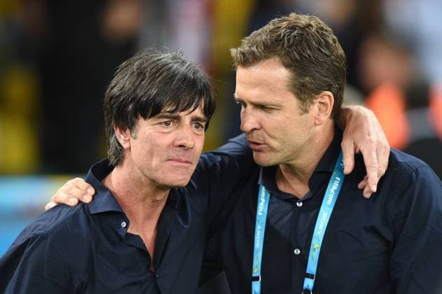 v.li:Bundestrainer Joachim Jogi LÖW (GER) und Oliver BIERHOFF (Teammanager GER) liegen sich nach Spielende in den Armen, Deutschland (GER) - Argentinien (ARG) 1-0 n.V Finale,Final,Spiel 64, am 13.07.2014 in Rio de Janeiro. Fussball Weltmeisterschaft 2014 in Brasilien vom 12.06. - 13.07.2014.