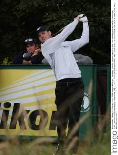 Germany s Martin Kaymer tees of on the 18th on the final practice day before the 2014 Open Golf Championships in Hoylake on July 16, 2014.  LON2014071604