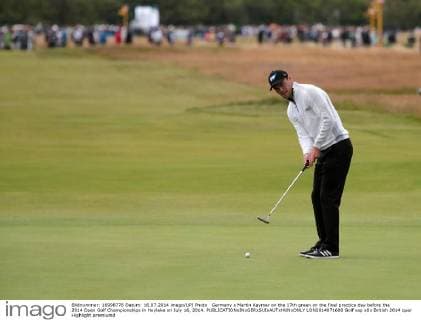 Germany s Martin Kaymer on the 17th green on the final practice day before the 2014 Open Golf Championships in Hoylake on July 16, 2014.  LON2014071608