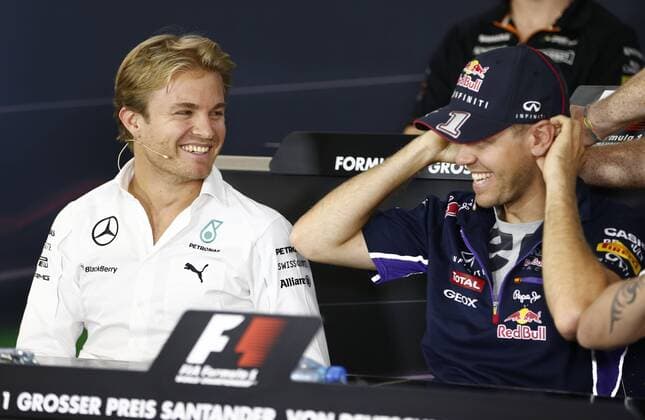 Motorsports: FIA Formula One World Championship 2014, Grand Prix of Germany, 6 Nico Rosberg (GER, Mercedes AMG Petronas F1 Team), 1 Sebastian Vettel (GER, Infiniti Red Bull Racing), xHOCHxZWEIx