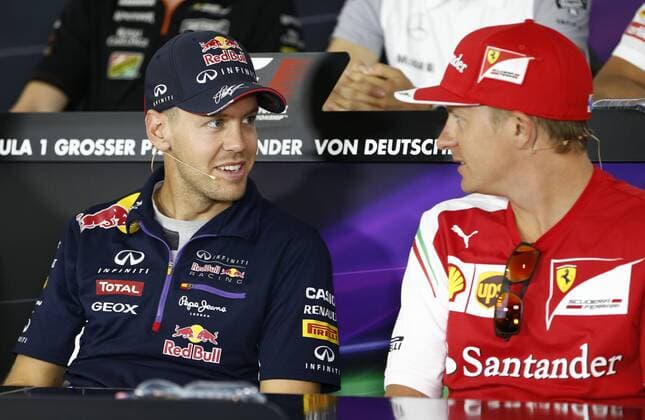 Motorsports: FIA Formula One World Championship 2014, Grand Prix of Germany, 1 Sebastian Vettel (GER, Infiniti Red Bull Racing), 7 Kimi Raikkonen (FIN, Scuderia Ferrari), xHOCHxZWEIx