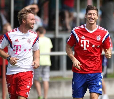 Robert Lewandowski und Fitnesstrainer Andreas Kornmayer (FC Bayern München) laufen Fussball FC Bayern München Training 17.07.2014
