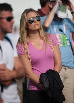 Tiger Wood s girlfriend Lindsey Vonn watches the golf on the second day of the 2014 Open Golf Championships in Hoylake on July 18, 2014.  LON2014071830