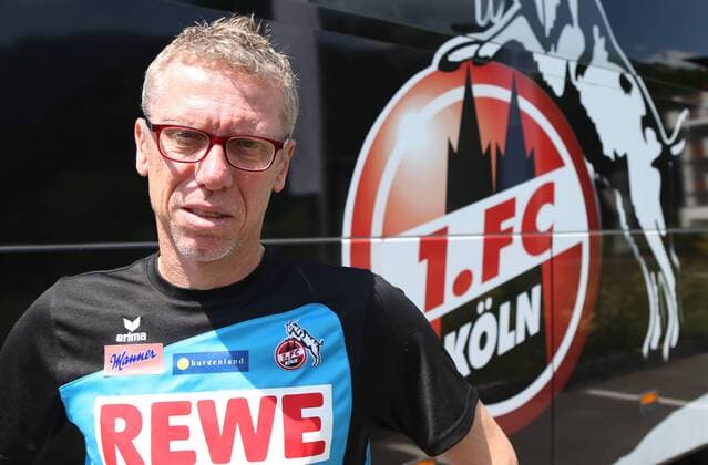SOCCER - Peter Stöger, photo shoot SOELL,AUSTRIA,25.JUL.14 - SOCCER - DFL, 1. Deutsche Bundesliga, 1. FC Köln, photo shooting with Peter Stöger. Image shows head coach Peter Stöger (Köln). Keywords: logo. 