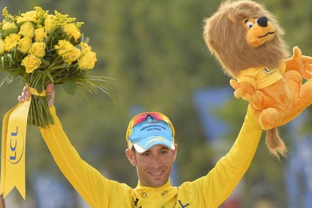 20140727 - PARIS, FRANCE: Italian Vincenzo Nibali of Astana Pro Team celebrates on the podium after winning the general ranking after the last stage of the 101st edition of the Tour de France cycling race, 137,5km from Evry to Paris Champs-Elysees, France, on Sunday 27 July 2014. DAVIDxSTOCKMAN  04266013