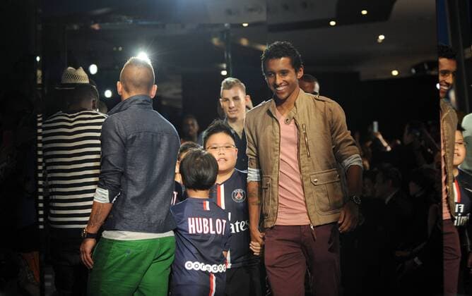 Football stars of France s Paris Saint-Germain Football Club parade at a fashion show of Swiss watch brand Hublot during the Asia tour of the club in Hong Kong, China, 27 July 2014. Paris Saint-Germain football stars wow fans at watch fashion show in Hong Kong  20140727_10773