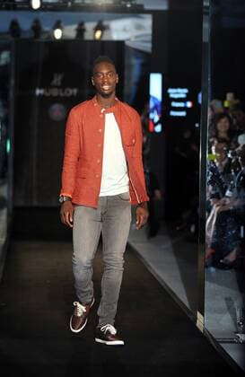 Blaise Matuidi of France s Paris Saint-Germain Football Club parades at a fashion show of Swiss watch brand Hublot during the Asia tour of the club in Hong Kong, China, 27 July 2014. Paris Saint-Germain football stars wow fans at watch fashion show in Hong Kong  20140727_30683