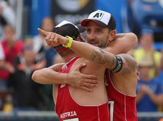 BEACH VOLLEYBALL - FIVB, Grand Slam Klagenfurt KLAGENFURT,AUSTRIA,31.JUL.14 - BEACH VOLLEYBALL - FIVB World Tour 2014, Grand Slam Klagenfurt. Image shows the rejoicing of Alexander Horst and Clemens Doppler (AUT). 