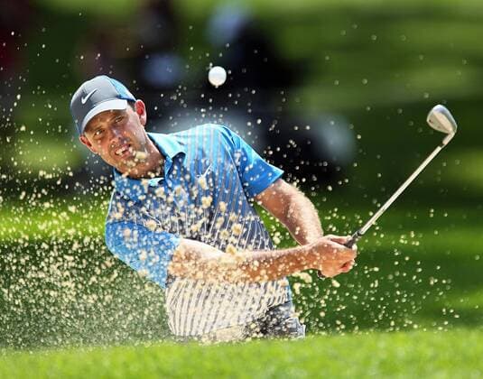 July 31, 2014 - Akron, OH, USA - Charl Schwartzel chips from a bunker on the 8th hole during the first round in the WGC-Bridgestone Invitational at Firestone Country Club in Akron, Ohio, on Thursday, July 31, 2014. WGC-Bridgestone Invitational, first round - ZUMAm67
