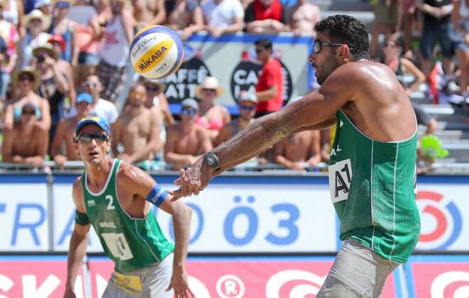 BEACH VOLLEYBALL - FIVB, Grand Slam Klagenfurt KLAGENFURT,AUSTRIA,01.AUG.14 - BEACH VOLLEYBALL - FIVB World Tour 2014, Grand Slam Klagenfurt. Image shows Emanule Rego and Pedro Solberg Salgado (BRA). 