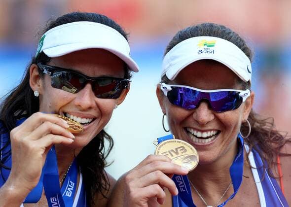 BEACH VOLLEYBALL - FIVB, Grand Slam Klagenfurt KLAGENFURT ,02.AUG.14 - BEACH VOLLEYBALL - FIVB World Tour 2014, Grand Slam Klagenfurt, award ceremony. Image shows the rejoicing of Talita Da Rocha Antunes and Larissa Franca (BRA). 