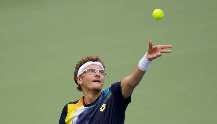 TORONTO, Aug. 4, 2014 -- Denis Istomin of Uzbekistan serves during the first round of men s singles at the 2014 Rogers Cup in Toronto, Canada, Aug. 4, 2014. (SP)CANADA-TORONTO-TENNIS-ROGERS CUP-MEN S SINGLES ZouxZheng 