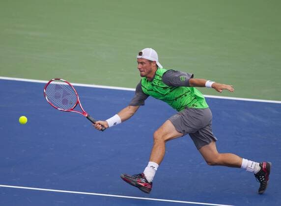 TORONTO, Aug. 4, 2014 -- Lleyton Hewitt of Australia returns the ball during the first round of men s singles at the 2014 Rogers Cup in Toronto, Canada, Aug. 4, 2014. (SP)CANADA-TORONTO-TENNIS-ROGERS CUP-MEN S SINGLES ZouxZheng 
